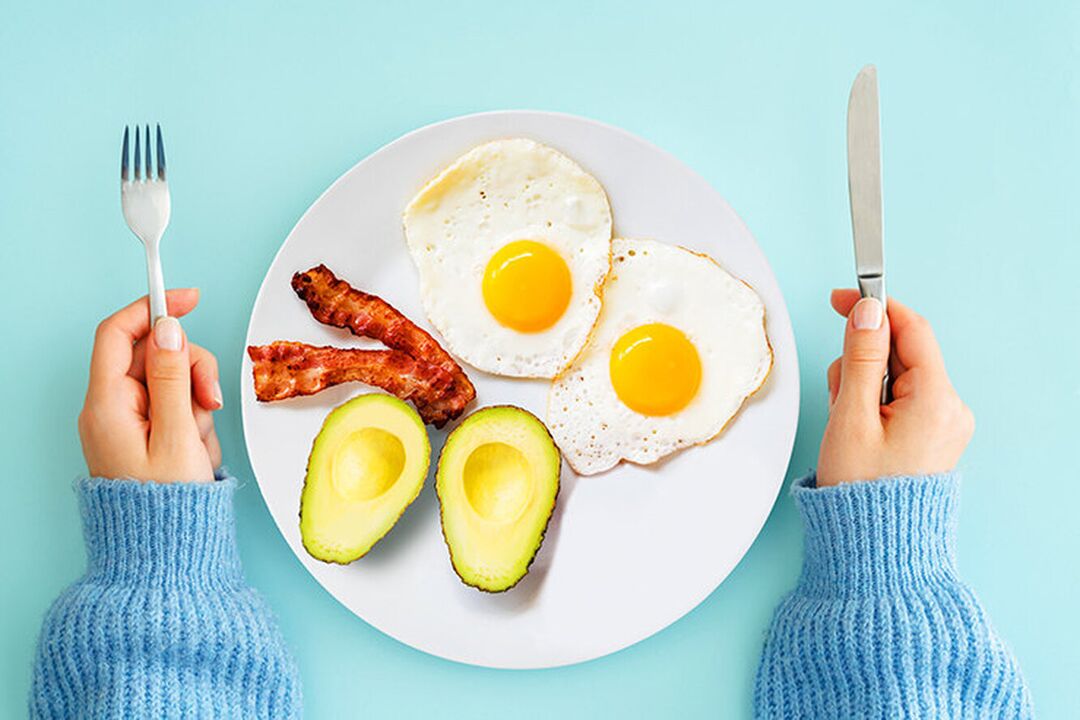 Perfect breakfast on the keto diet menu - eggs with bacon and avocado